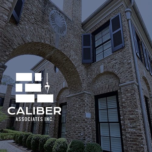 Caliber Associates logo with building behind it